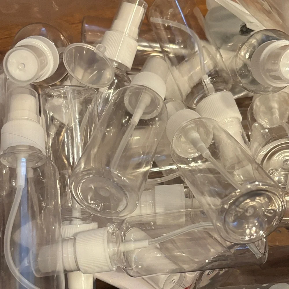 18 Clear Plastic Spray Bottles with White Pumps - Travel Friendly